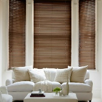 Fired Walnut Wooden Blinds create a warm atmosphere in your room