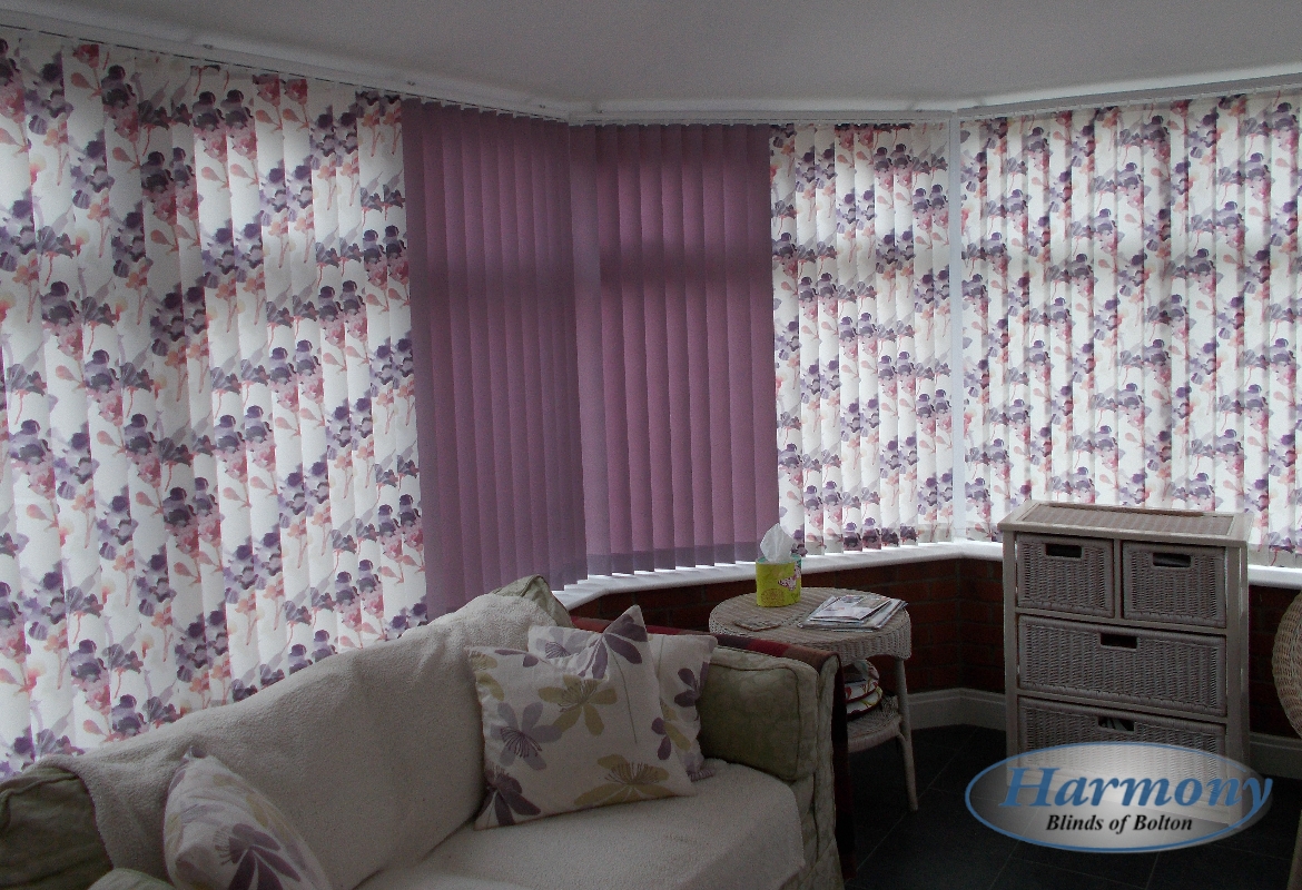 Patterned & Plain Lilac Flower Vertical Blinds in a Conservatory