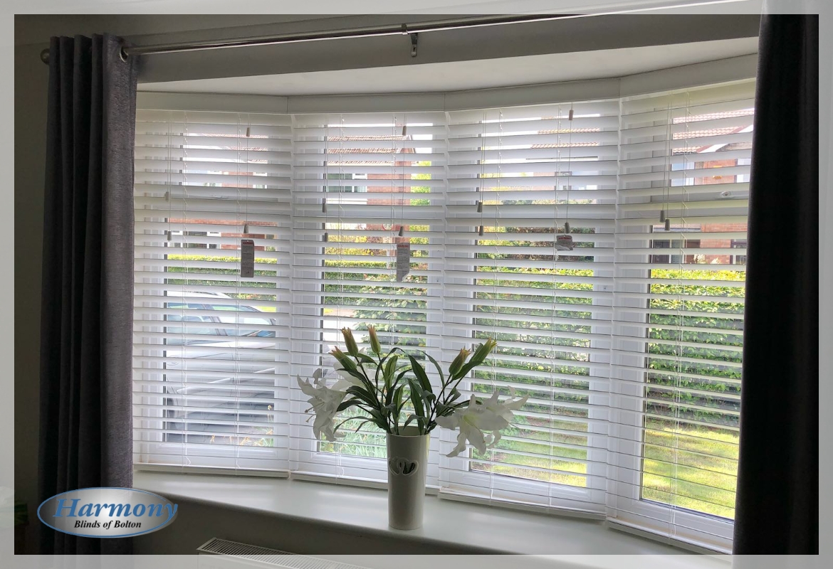 Four Wooden Blinds in a Bay Window