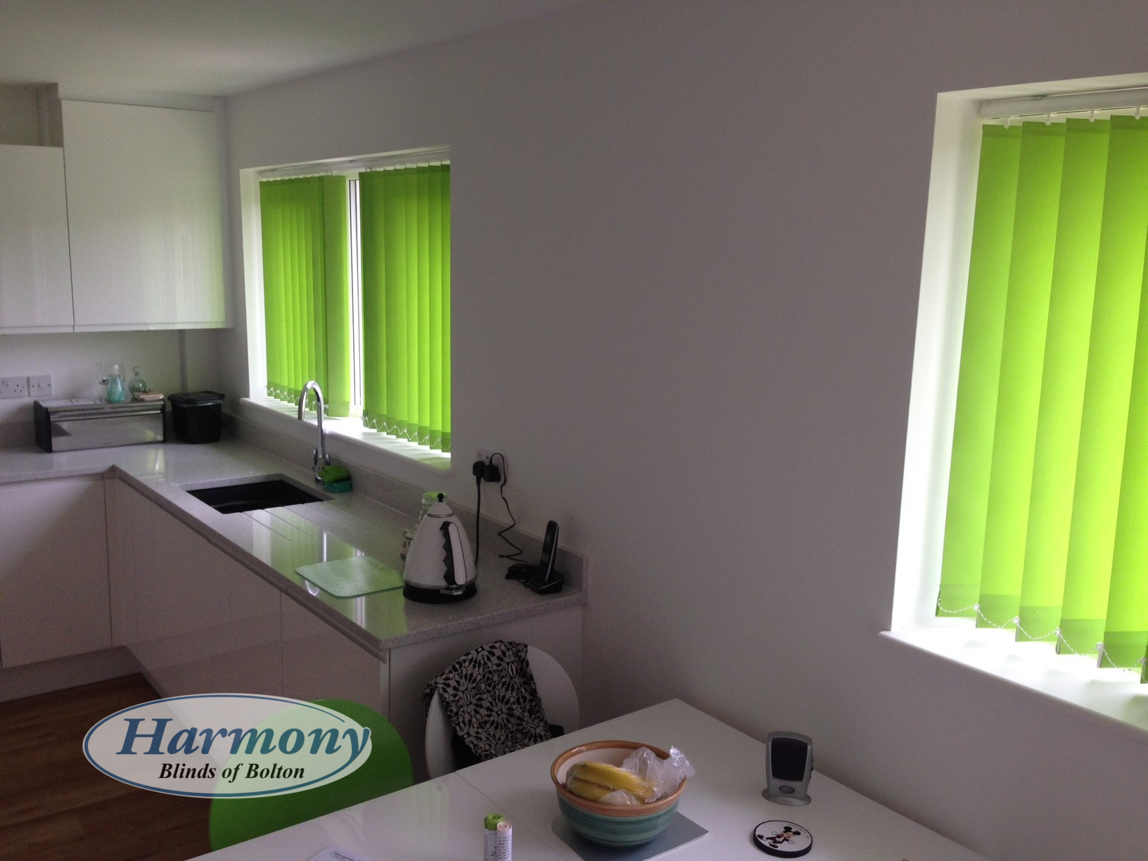 Lime Green Vertical Blinds in a Kitchen Harmony Blinds of Bolton and