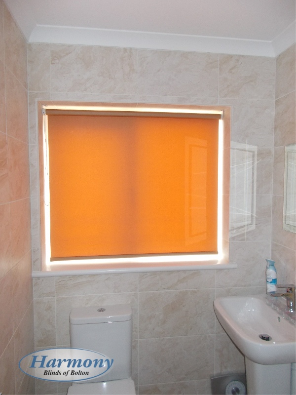 Orange Roller Blind in a Bathroom