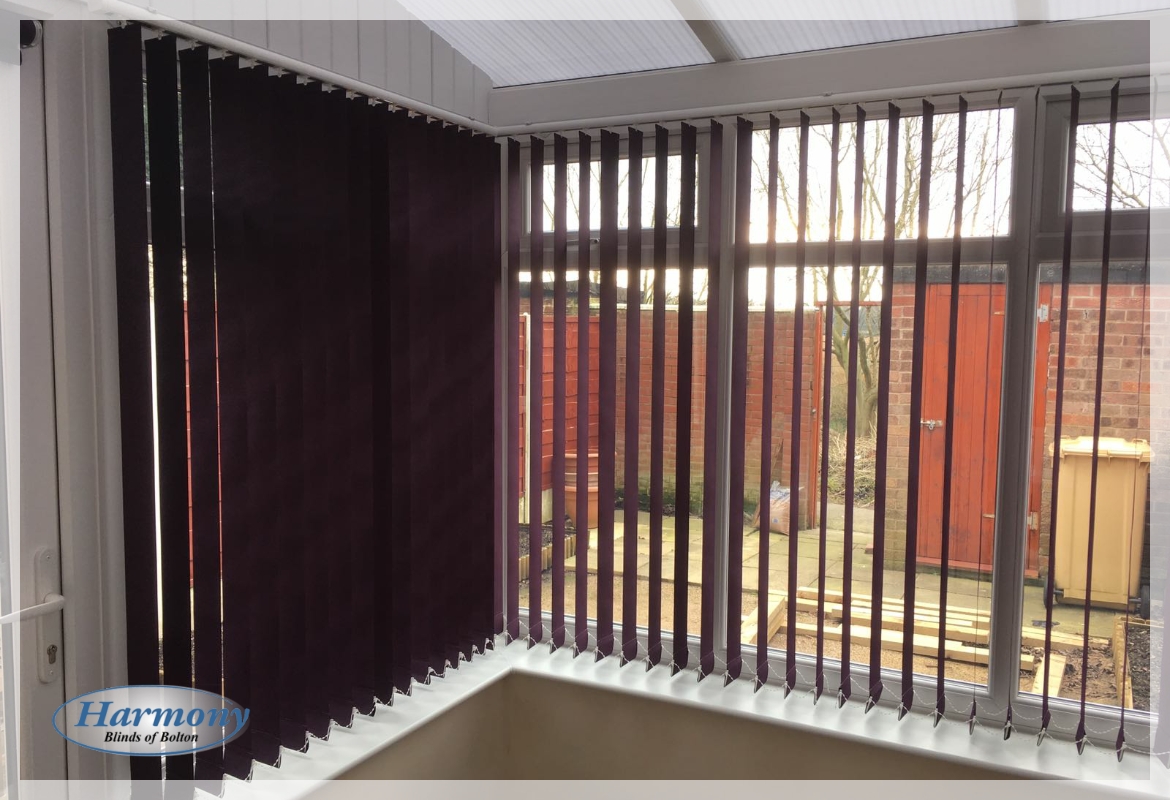 Carnival Grape Vertical Blinds in a Conservatory
