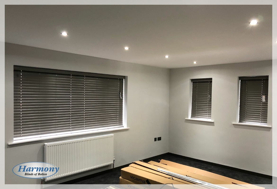 Trio of Grey Wooden Blinds in a Modern Living Area